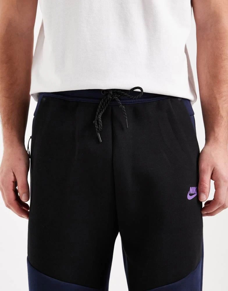 NIKE Nike Tech Fleece open hem joggers in black and navy 4
