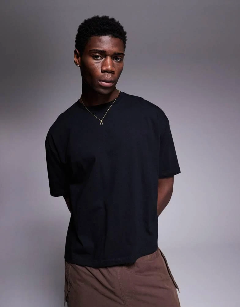 ASOS ASOS DESIGN boxy oversized t-shirt with dragon graphic in black 2