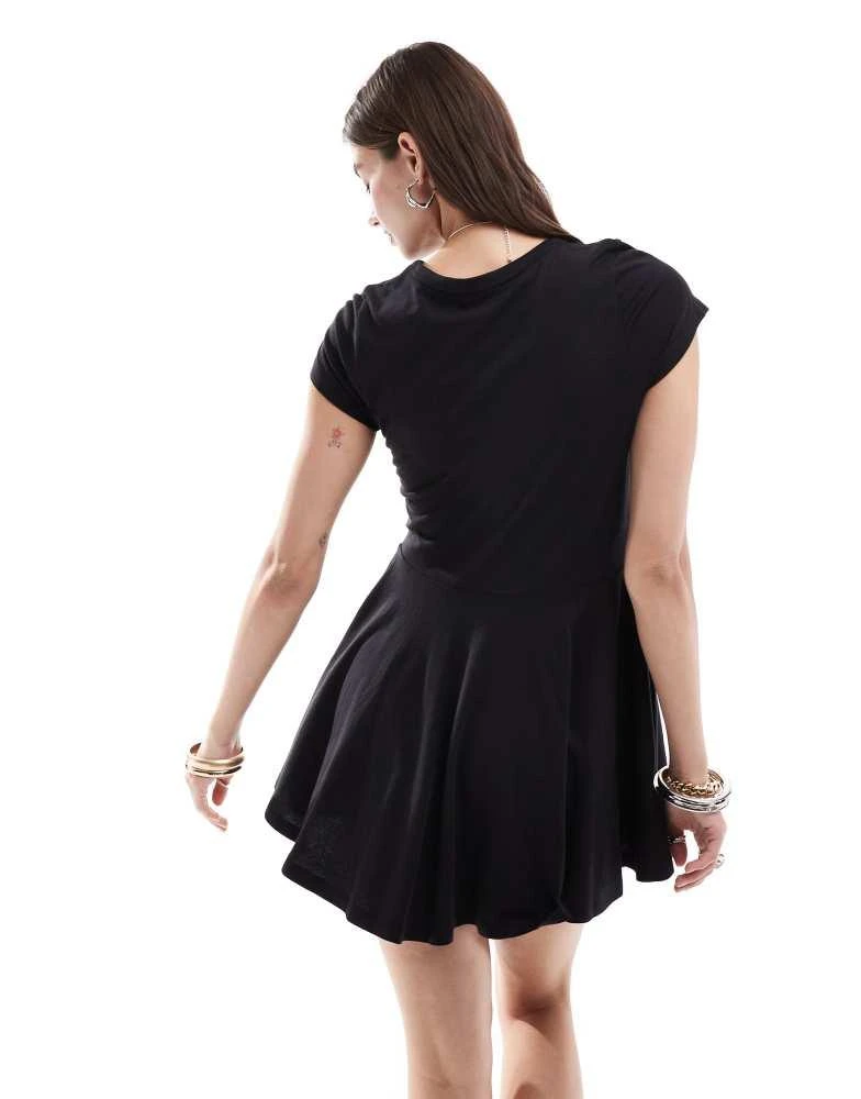 Shop Monki short sleeve mini jersey dress with an a-line skirt in black on  Sale at BeyondStyle  Get 56% Off Monki short sleeve mini jersey dress with  an a-line skirt in