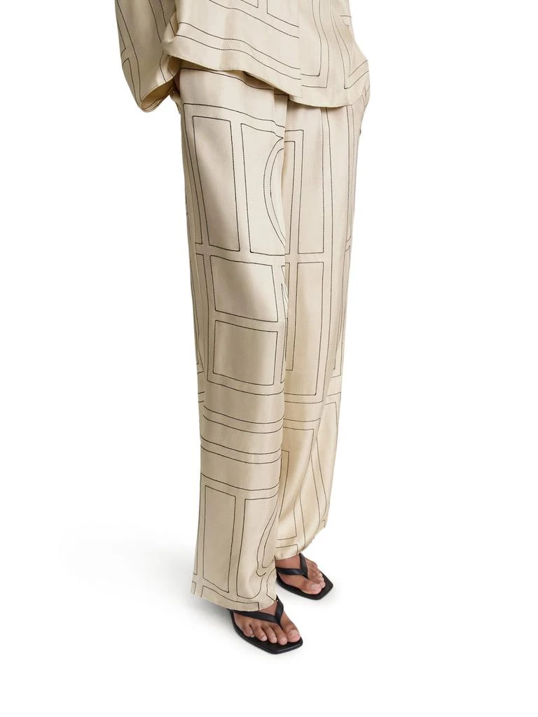 Totême Monogram silk PANTS 5