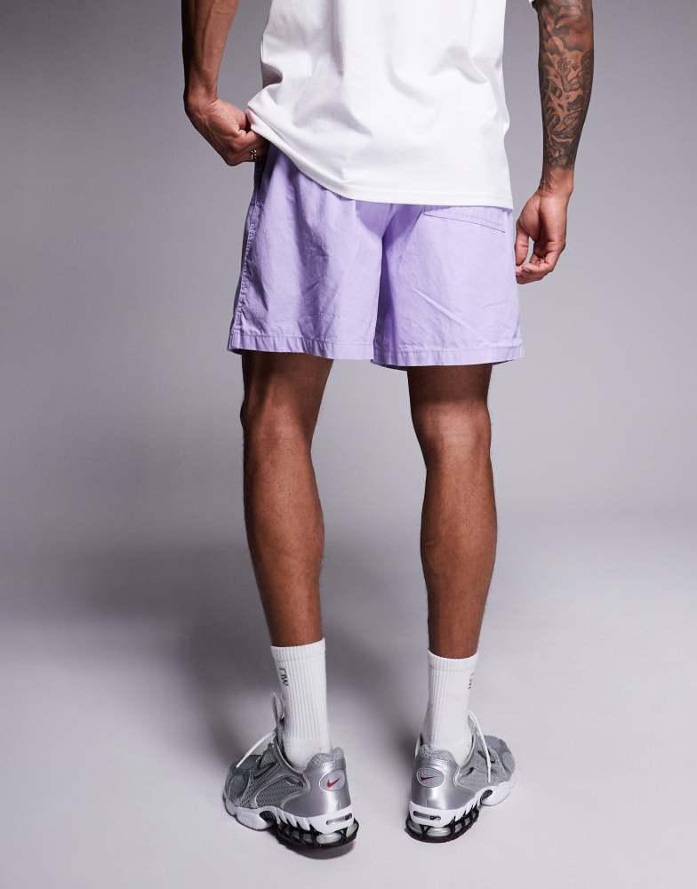 lilac nike woven shorts