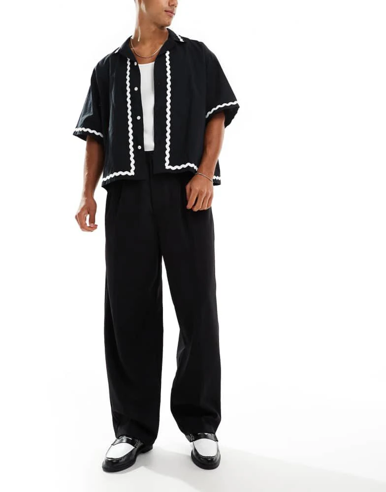 Bershka Bershka baggy tailored trouser in black 4