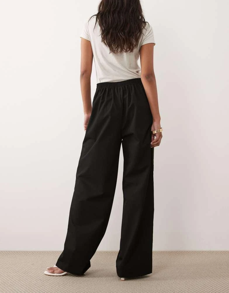 Mango Mango tie waist straight trouser with side stripe in black 3