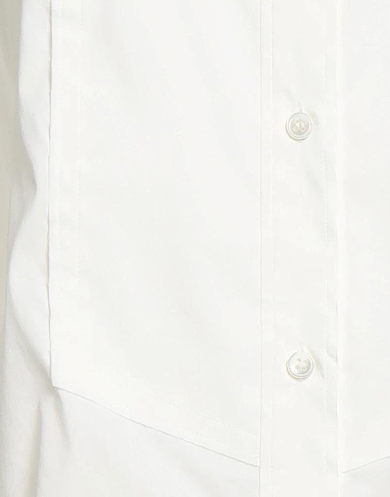 Tom Ford Solid color shirts
blouses 4