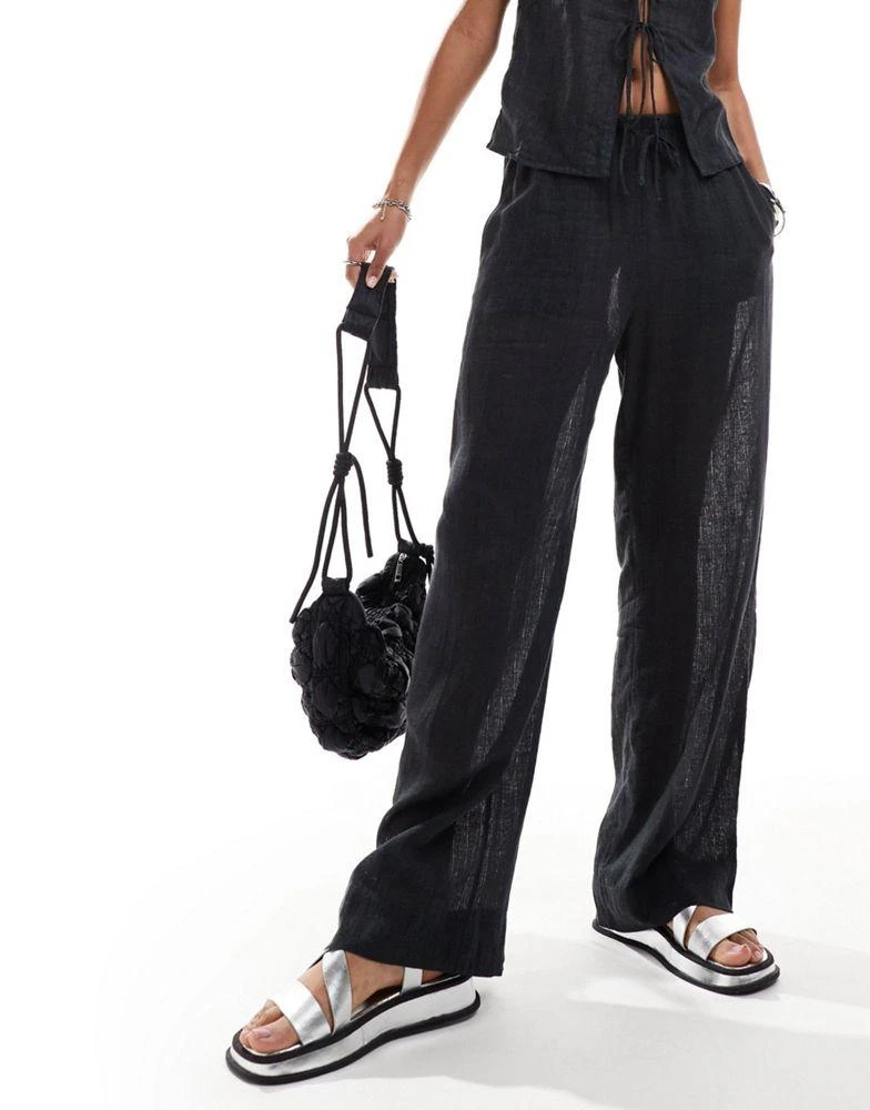 Weekday Weekday Mia co-ord pointelle trousers in off-black 5