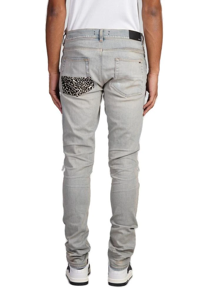 AMIRI Amiri Leopard-Detailed Distressed Jeans 2