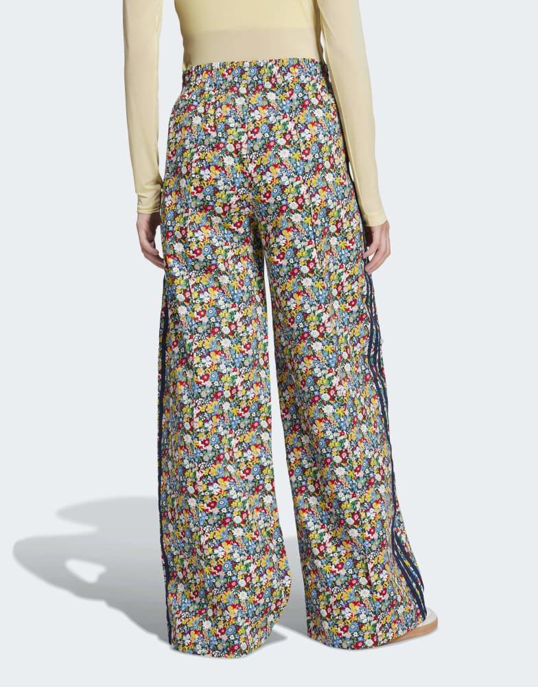 Adidas adidas Originals x Liberty London wide leg track pants in
