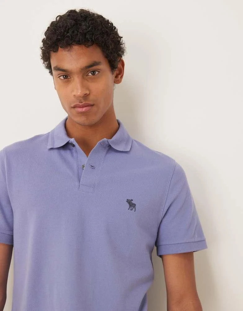 Abercrombie & Fitch Abercrombie & Fitch textured icon detail polo top in purple 1