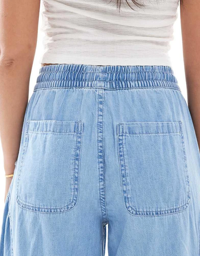 ASOS ASOS DESIGN soft wide leg pull on jean with stitch detail in mid blue 4