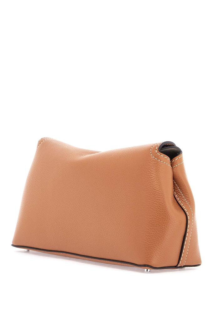 Totême tan leather clutch with t-lock closure and adjustable shoulder strap