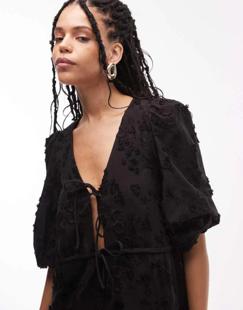 & Other Stories & Other Stories embroidered mini dress with front tie detail and tiered hem in black 4