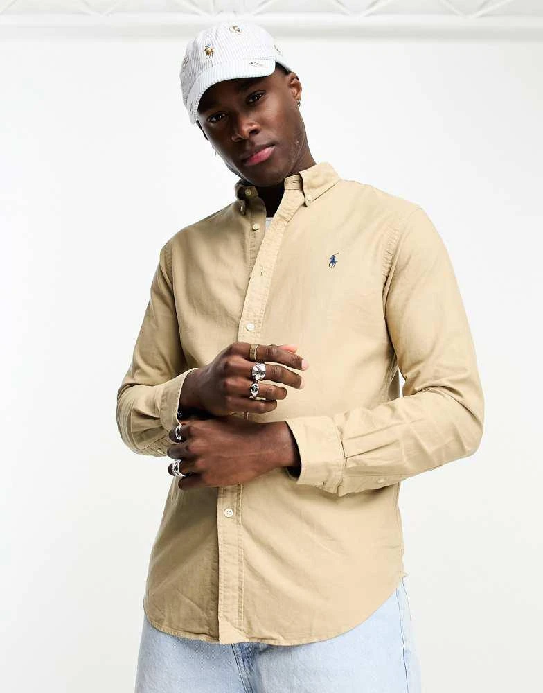Ralph Lauren Polo Ralph Lauren icon logo slim fit garment dyed oxford shirt in tan 1