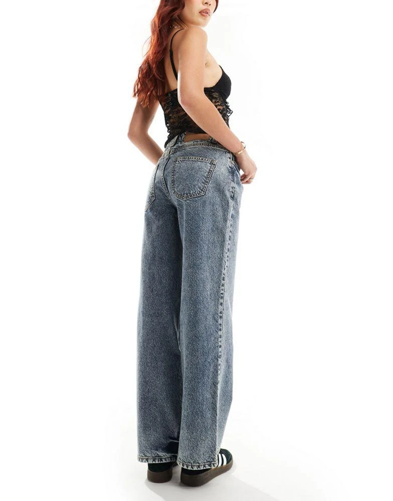 Reclaimed Vintage Reclaimed Vintage 00s low rise jean in blue acid wash 3
