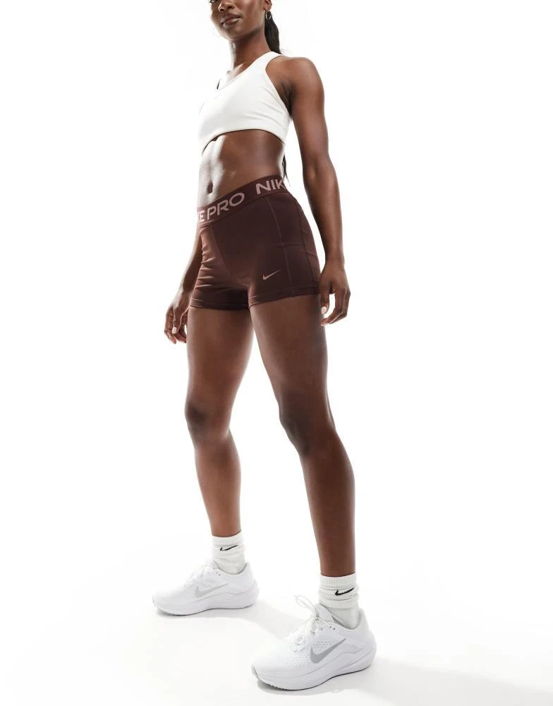 NIKE Nike Pro Training 365 3 inch leakproof leggings shorts in dark brown 3