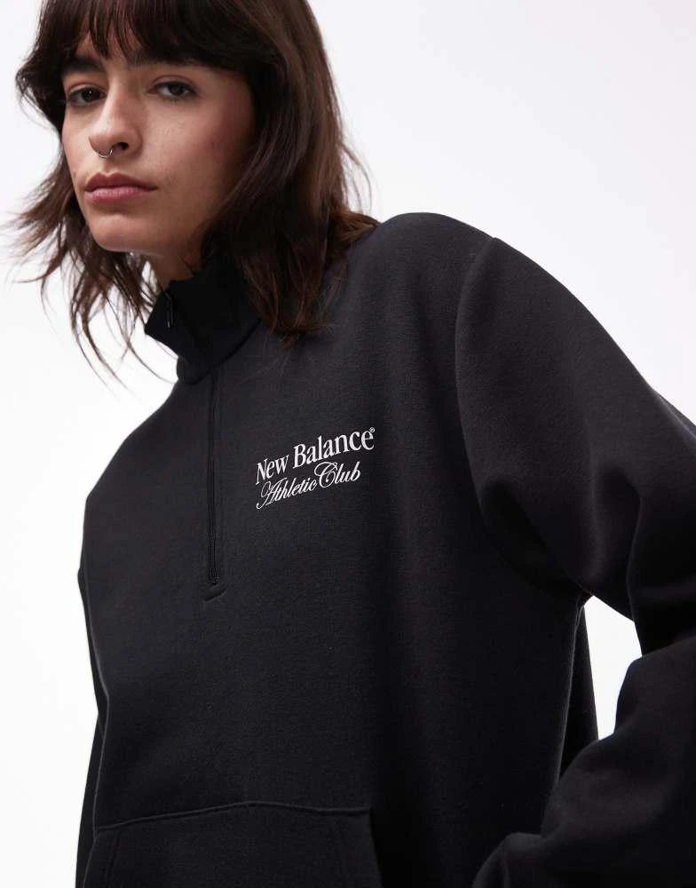 New Balance New Balance graphic half zip hoodie in black 3