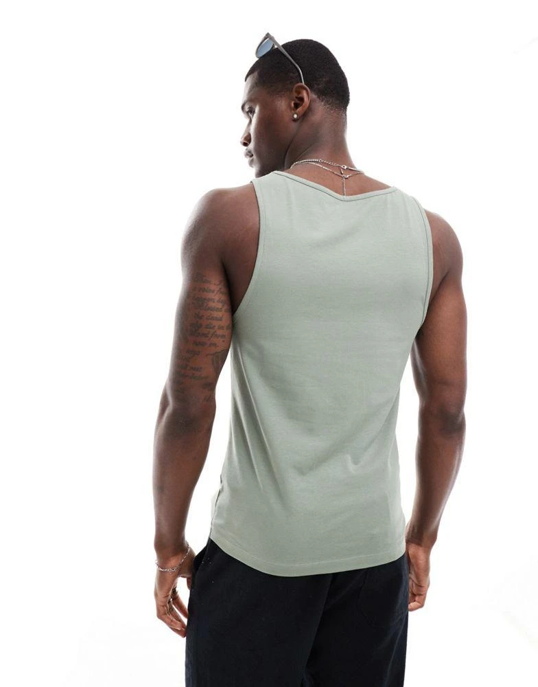 ASOS ASOS DESIGN essential muscle fit vest in mid green 4