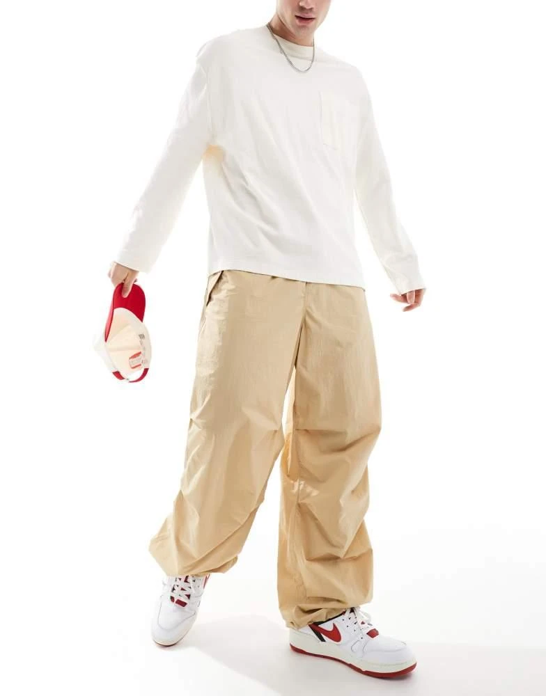 Tommy Jeans Tommy Jeans nylon parachute pants in beige 1