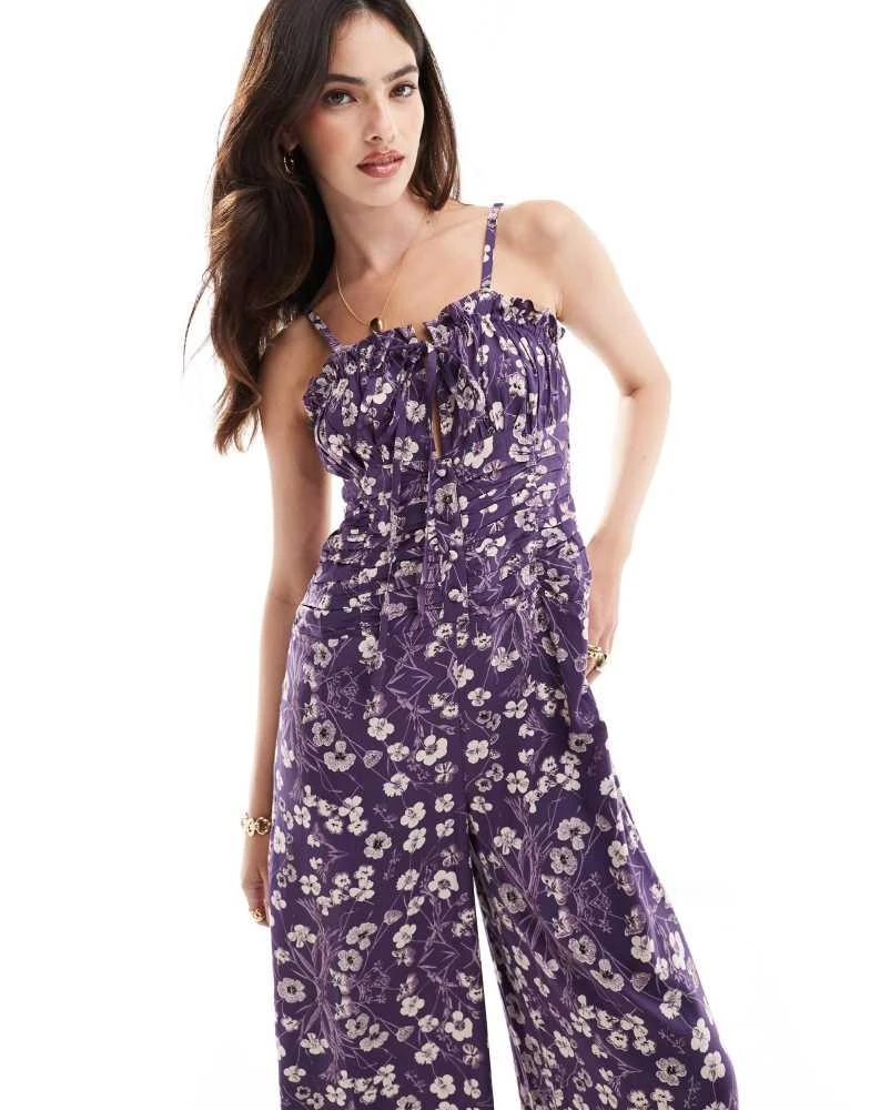 ASOS ASOS DESIGN frill bust ruched waist strappy spun jumpsuit in purple and white floral 1