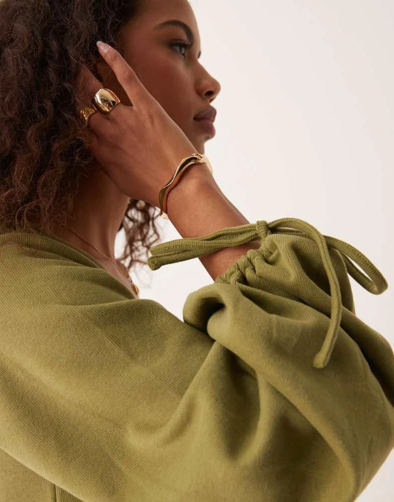 ASOS ASOS DESIGN supersoft v-neck flare hem skirt mini dress with tie sleeve in olive 2