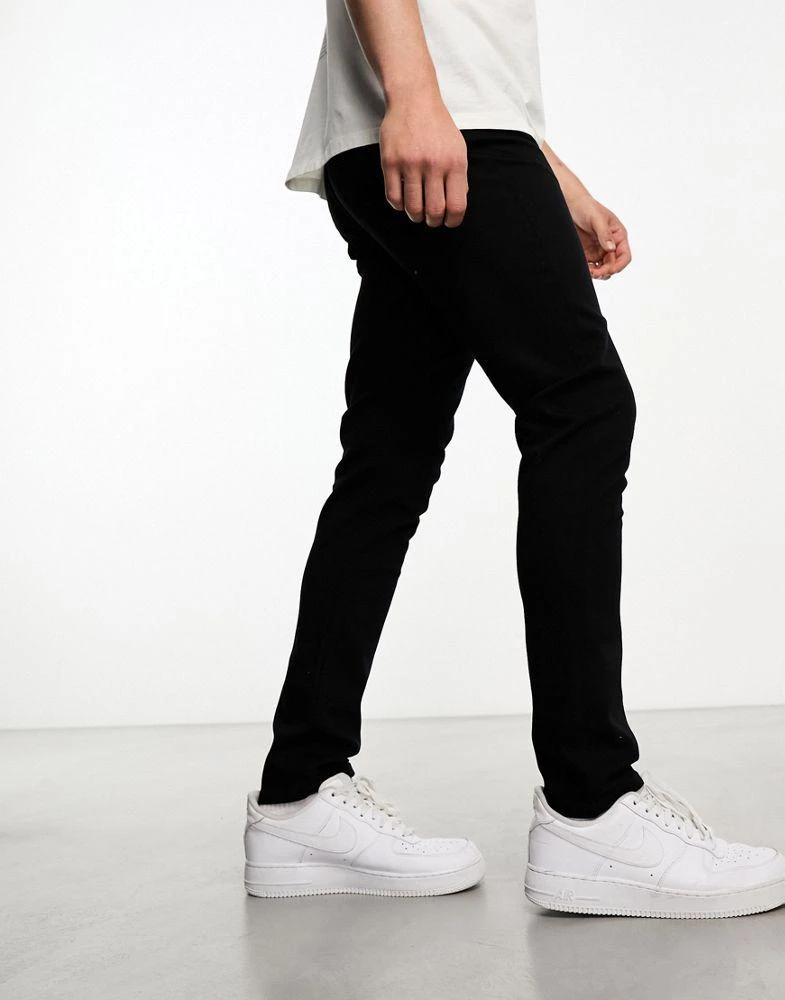 ASOS ASOS DESIGN skinny jeans in no fade black 4
