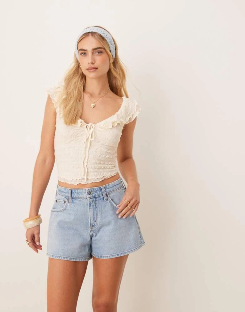 Shop Abercrombie Fitch curve love mid rise a line denim shorts