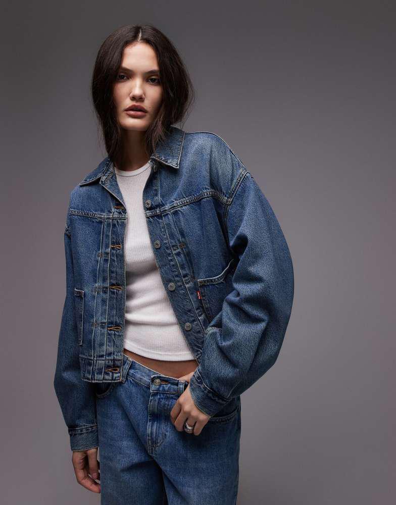 Shop Levi's balloon sleeve denim trucker jacket in blue on Sale at