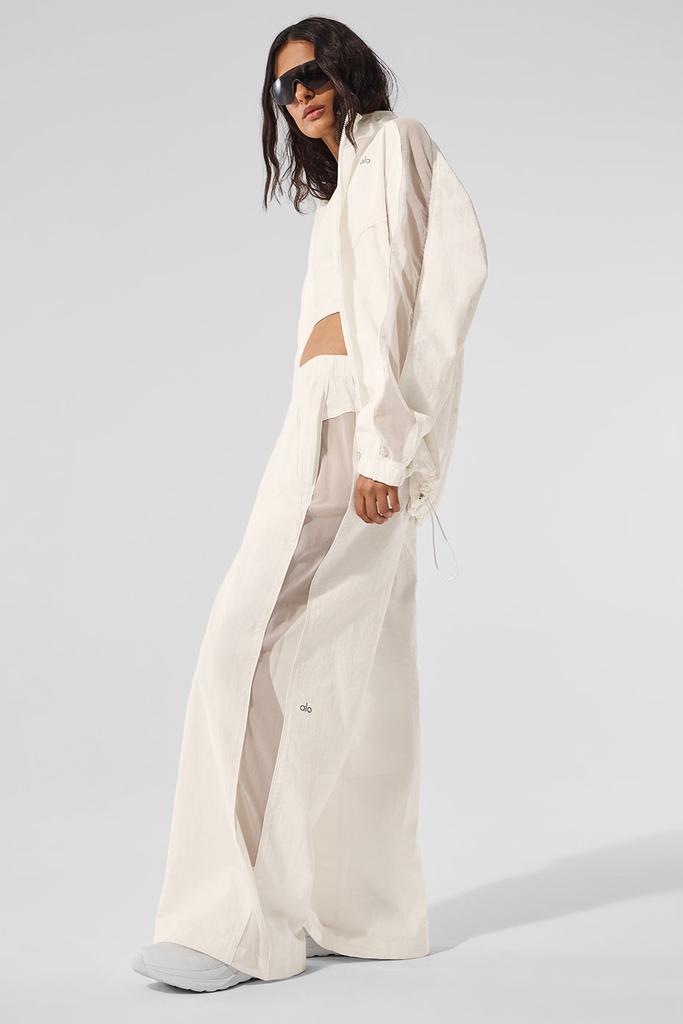 alo アシンメトリック シアー グロー ロングスリーブ アイボリー Asymmetric Sheer Glow Long Sleeve - Ivory | ALO