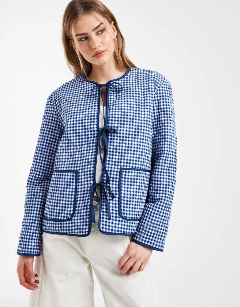 Pieces Pieces tie front quilted jacket in blue and white gingham