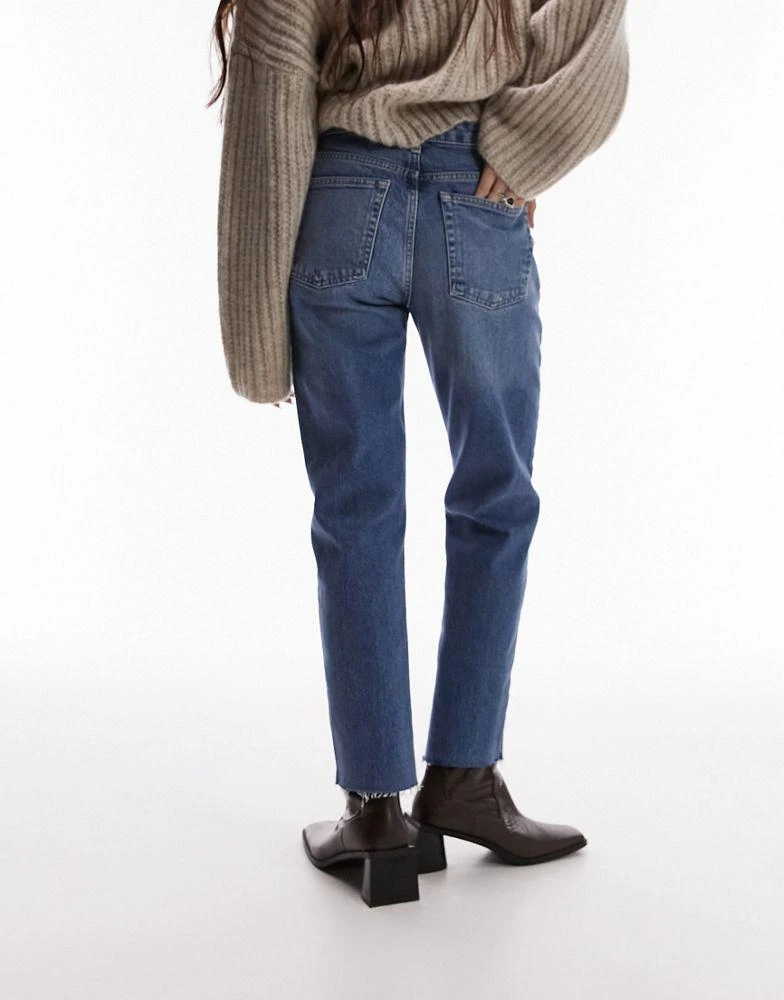 Topshop Topshop mid rise straight cropped jean with raw hems in mid blue 4
