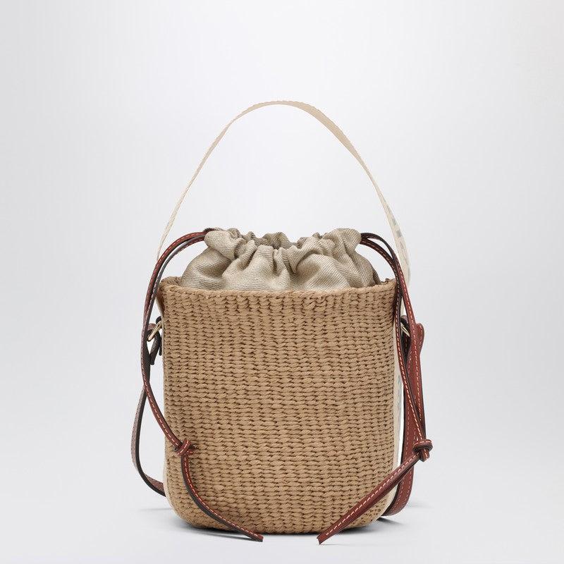【関税&送料込】Chloe Small Woody Raffia Bucket Bag Woody Small bucket bag in brown - Chloe | Mytheresa