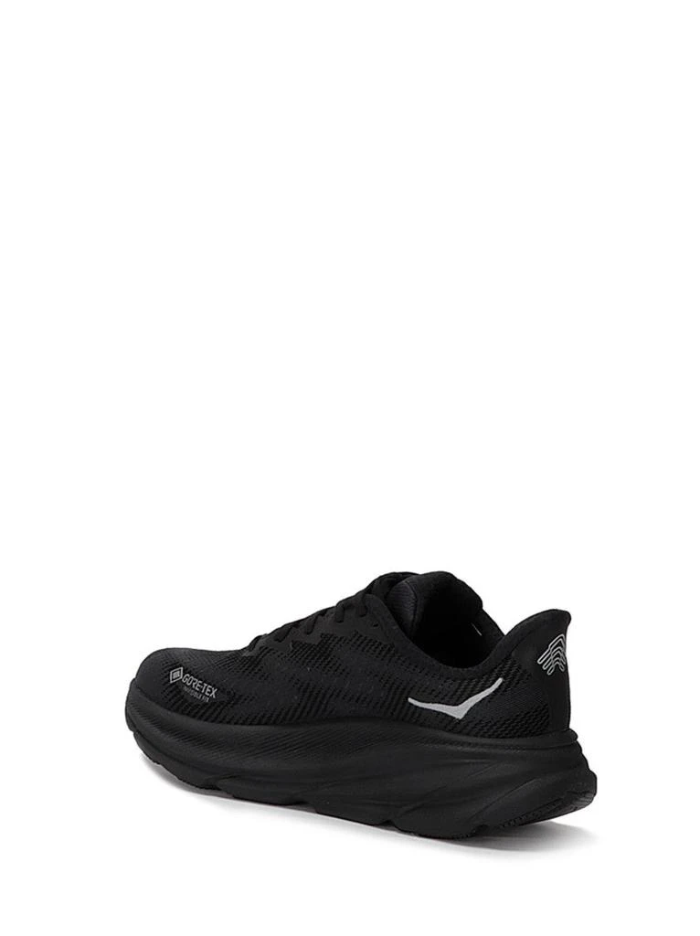 Hoka One One Streamlined Black Sneakers With Cushioned Sole And Reflective Details 3