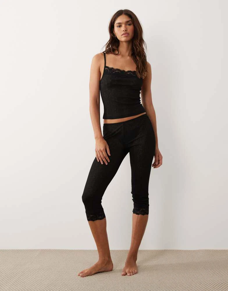 ASOS ASOS DESIGN semi sheer capri pyjama trouser with lace trim in black