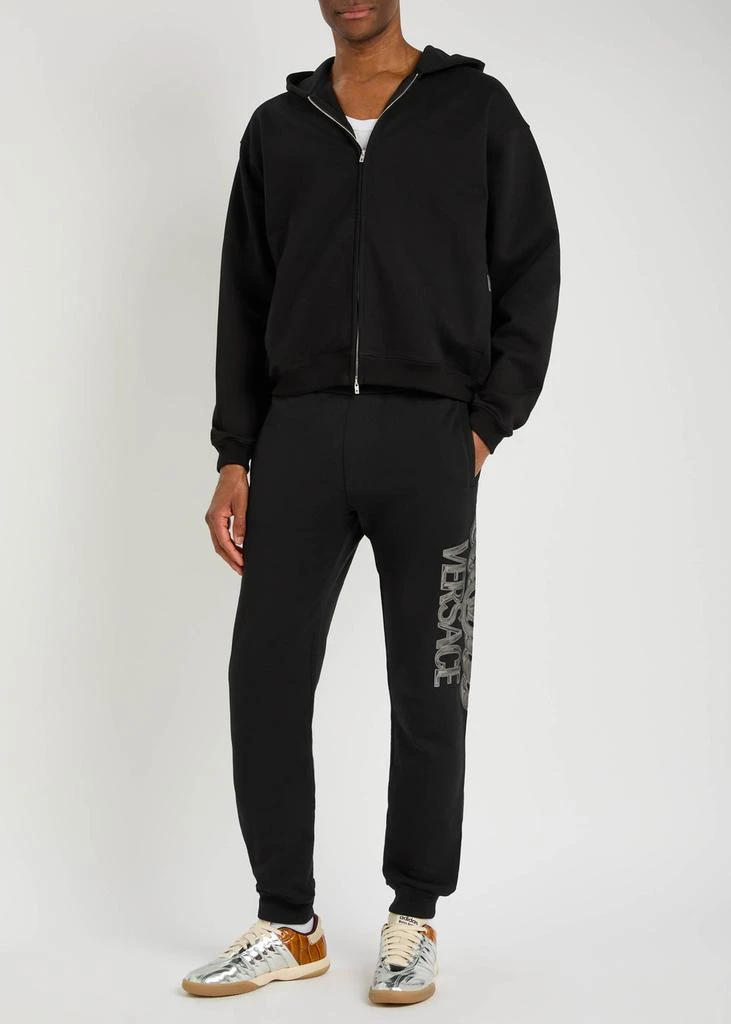 Versace Logo-printed cotton sweatpants 4