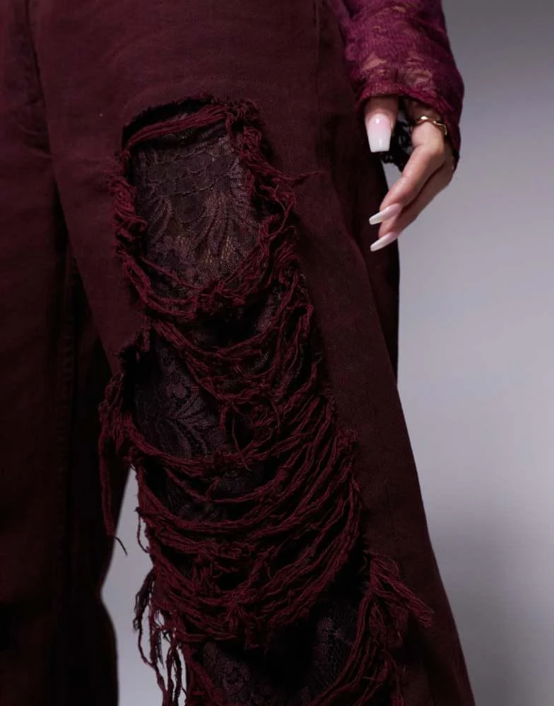 ASOS ASOS X THE SOURCED COLLECTION baggy jeans with lace and rips in burgundy 5