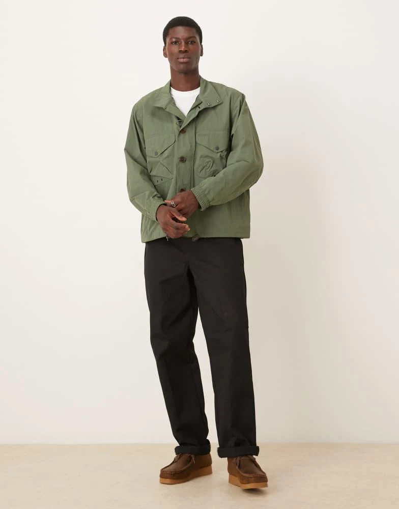 Barbour Barbour short showerproof jacket in green 2