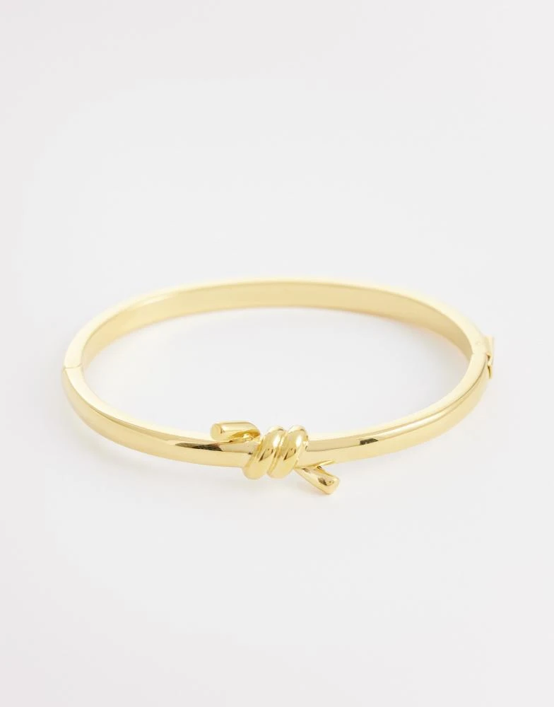 Abbott Lyon Abbott Lyon twisted knot bangle in 18k plated stainless steel in gold