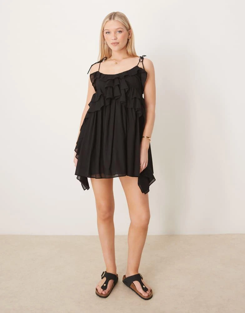ASOS Design scoop neck ruffle mini dress with tie straps in black-Multi ASOS Design scoop neck ruffle mini dress with tie straps in black-Multi