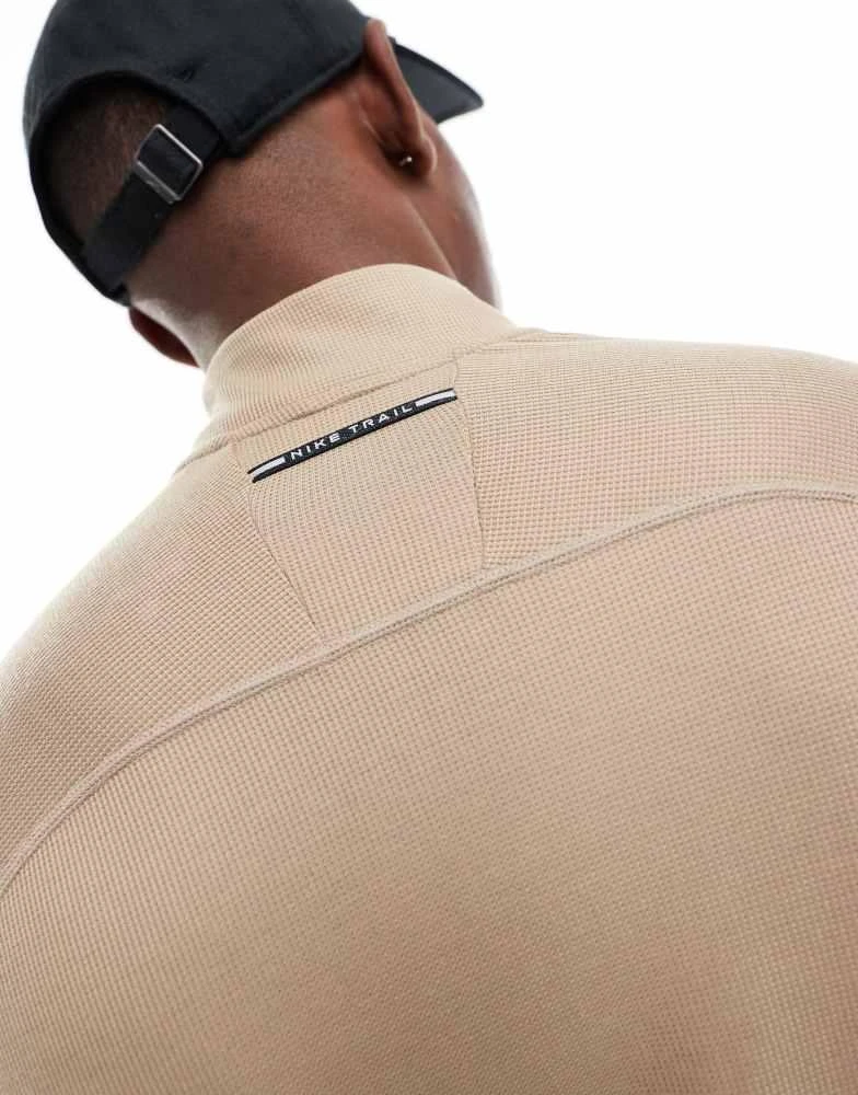 NIKE Nike Running Trail 1/4 zip sweatshirt in beige 2