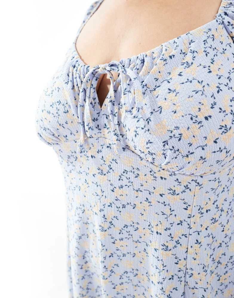 New Look Plus New Look Curve crinkle milkmaid midi dress in blue floral 3