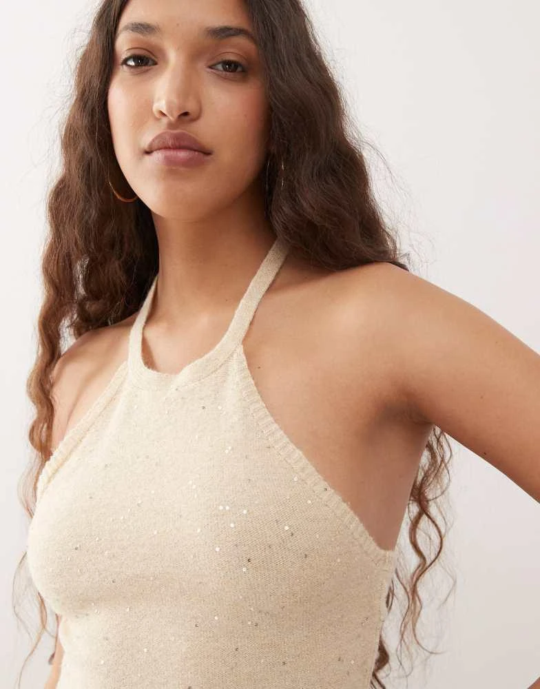 Shop Motel yakanta sequin detail knitted mini halter dress in gold on Sale  at BeyondStyle  Get 70% Off Motel yakanta sequin detail knitted mini halter  dress in gold with Limited-Time Flash