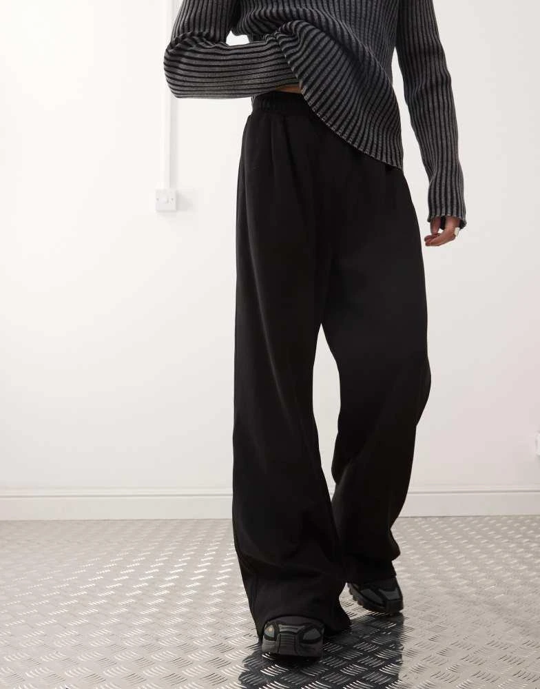 Weekday Weekday Wind super wide leg sweatpants with front pleats in black 1
