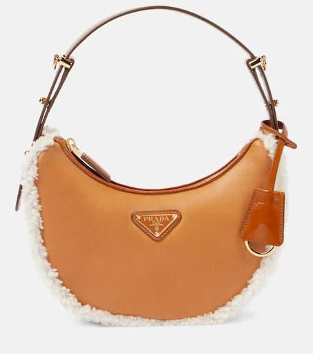 Prada Arqué Small shearling-trimmed leather shoulder bag 1