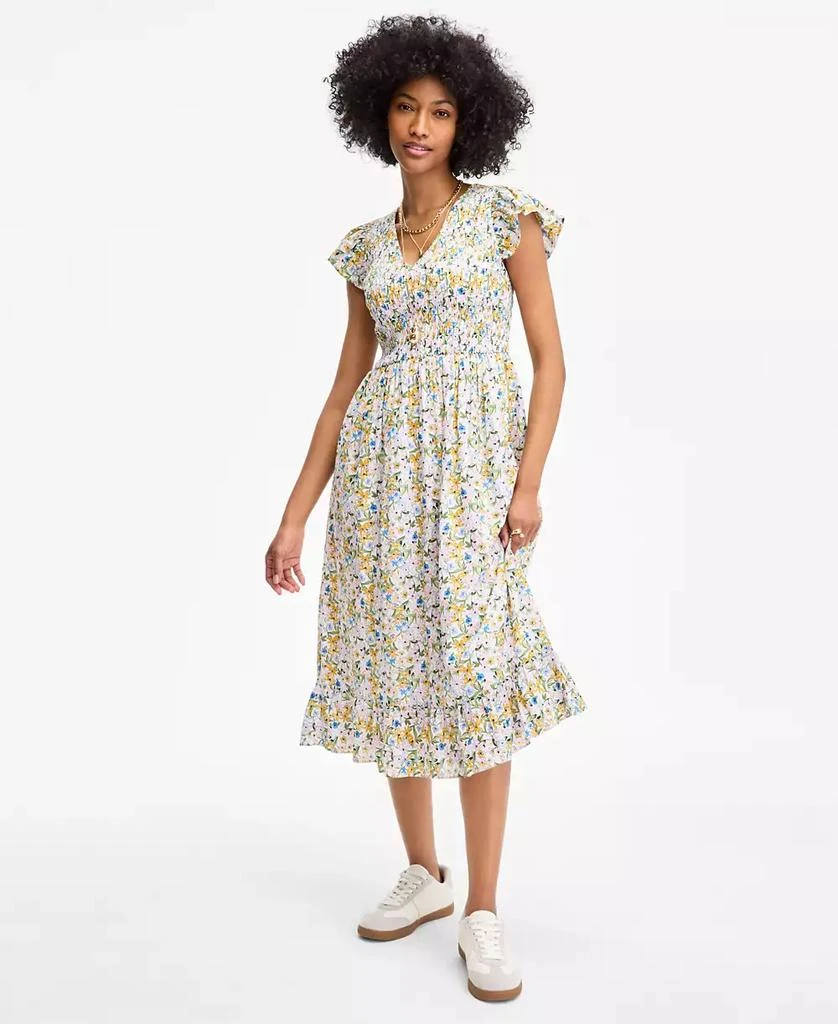 smocked silk midi dress Silk midi dress with ruffle neckline and smocked cuffs for a romantic