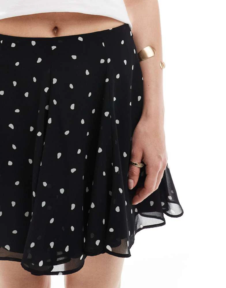 ASOS ASOS DESIGN flippy chiffon mini skirt in polka dot 4