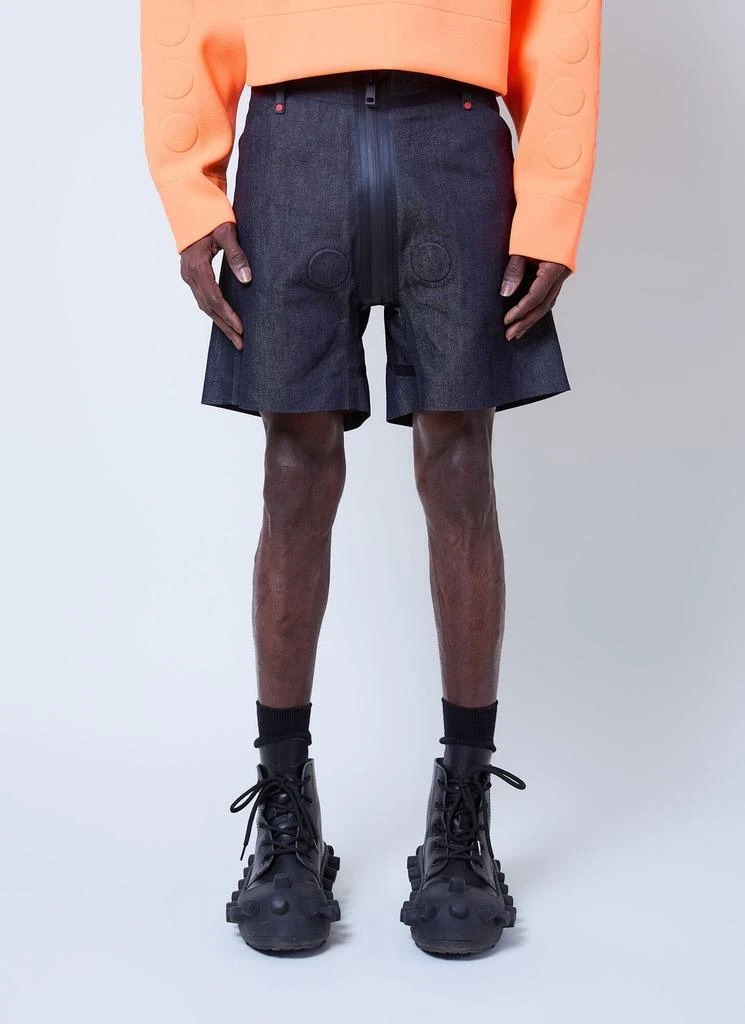 Walter Van Beirendonck Walter Van Beirendonck Embossed Raw Denim Shorts from Cettire