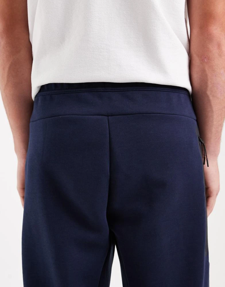 NIKE Nike Tech Fleece open hem joggers in black and navy 5