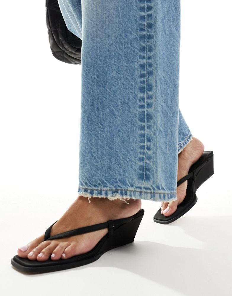 ASOS DESIGN ASOS DESIGN Tulum toe thong wedge sandals in black