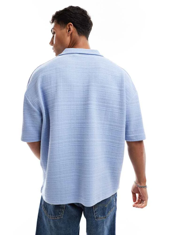 ASOS ASOS DESIGN oversized boxy polo in light blue 4
