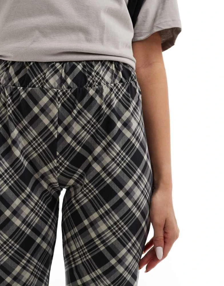 Noisy May Noisy May flared trousers in black check 3