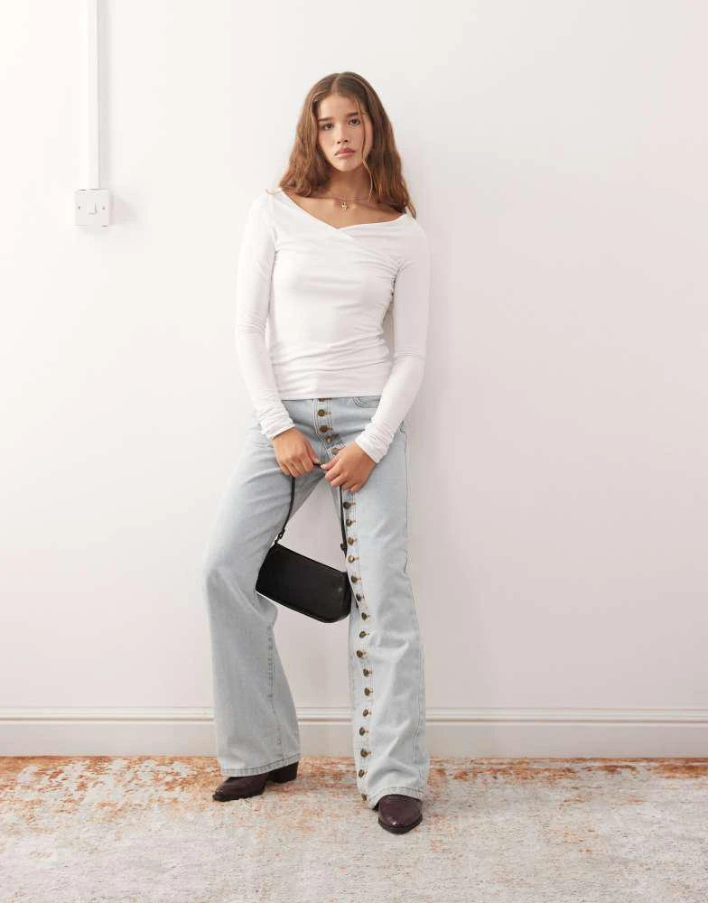 Weekday Weekday slim fit long sleeve wrap top in white 2